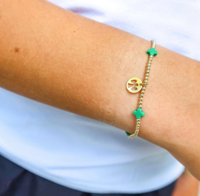 Gold bracelets with pearls and charms on a wrist against a white background - {Pre-Order} Limited Edition egives to Camp Mystic Bracelet - Houston, Texas 